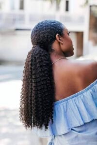 Low Kinky Curly Ponytail Hairstyle